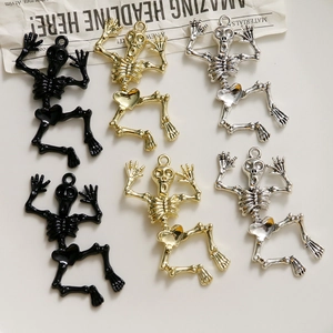 Halloween skeleton alloy pendants in black, gold, and silver for DIY jewelry crafting