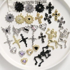 Gothic Halloween alloy charms set featuring skulls and crosses on a white tray