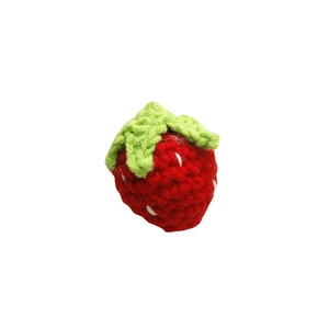 Handmade crochet strawberry charm with red body and green leaves for DIY accessories