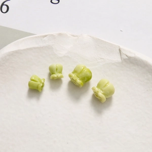 DIY 6mm hellgrüne Maiglöckchen-Blütenperlen aus Keramik für die Schmuckherstellung