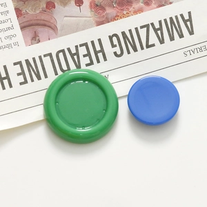Close-up of vibrant candy-colored resin charms for DIY earrings and hair accessories