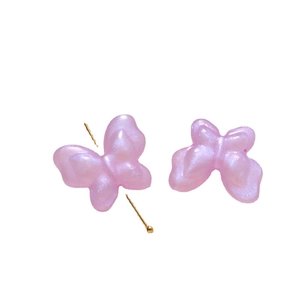 Pink pearlescent acrylic butterfly beads with glitter for DIY jewelry making and crafts