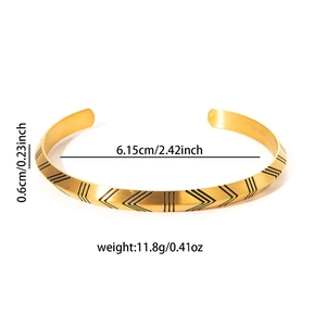 Detail view of 18k gold plated Viking rune cuff bracelet showing width and inner diameter