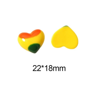 Macro view of 22x18mm heart-shaped resin beads with three-color gradient finish