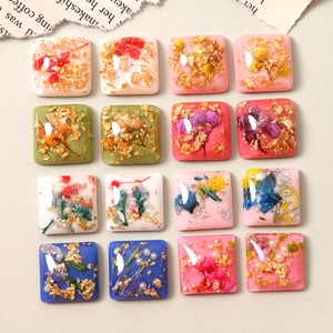 Handmade square resin charms with dried flowers and gold leaf foil for DIY crafts