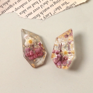 Irregular resin charm with pink dried flowers, pearls and gold foil in high-transparency