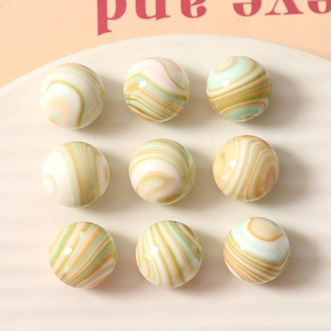 Perles géométriques polies à texture marbrée en spirale pour la création de bijoux