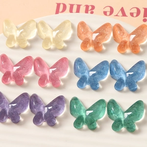 Set of colorful resin butterfly charms in six pastel shades for DIY crafting and jewelry