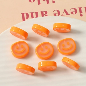 Cute translucent orange smiley face resin beads for DIY jewelry and hair accessories