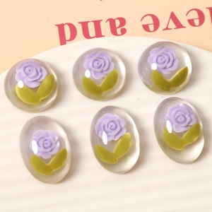 Detailed view of DIY resin purple tulip flower charms for hair clips and phone cases