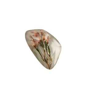 Transparent faceted resin pendant with dried narcissus flower inside for DIY jewelry