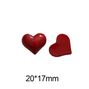 Macro detail of 20x17mm red heart resin charms showing glossy front and flat back views