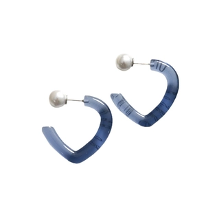 Translucent grey-blue heart earrings with faux pearl backs and resin flower texture