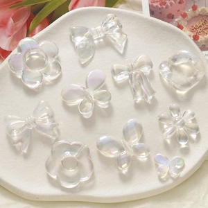Iridescent aurora resin flower and bow charms for DIY jewelry and phone case making