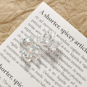 Macro shot of 3D aurora transparent bear resin charms for nail art and DIY jewelry