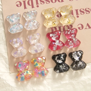 Cute resin bear DIY charms with glitter, gold leaf, and sequins for jewelry making