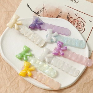 Set di 7 fermagli per capelli in acrilico ondulato con fiocchi e trama marmorizzata