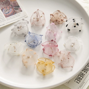 Elegant organza flower petal charms for DIY jewelry making in various soft pastel colors