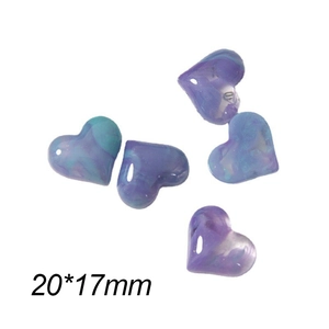 Detail view of 20x17mm purple marble resin heart charms with pre-drilled holes
