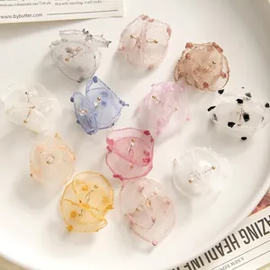 Elegant 3D organza flower pendants with pom-pom edges in various soft pastel colors