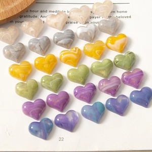 Marbled resin heart beads with gold glitter for jewelry and hair accessory DIY projects
