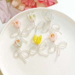 Handmade tulip beaded charms in pink and yellow for DIY jewelry and hair accessories