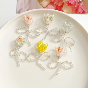 Handmade tulip beaded flower charms in various colors for DIY jewelry and hair accessories