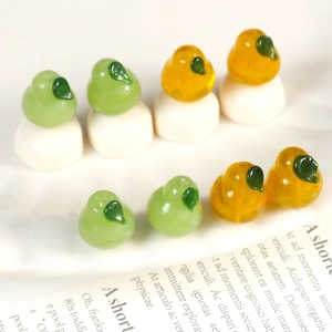 Handmade 3D glass pear beads in green and amber for DIY jewelry and hair accessories