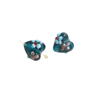 Deep blue heart-shaped glass beads with 3D floral accents for DIY jewelry making