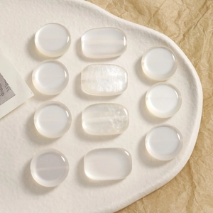 Translucent milky white resin beads in round and oval shapes for DIY jewelry making