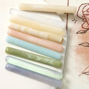 Set of 9 minimalist marble-patterned acetate hair clips in assorted macaron colors
