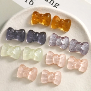 Translucent glitter resin bow accessories in multiple colors for DIY jewelry and crafts