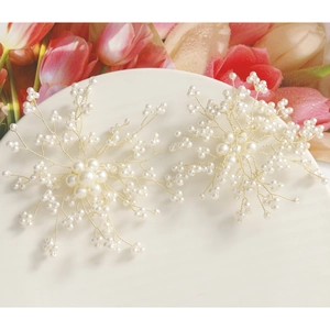 Detailed close-up of handmade faux pearl flower clusters with gold wire weaving details