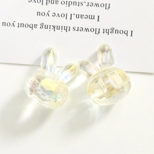 Detail of aurora resin bunny charms for DIY jewelry and phone case accessories