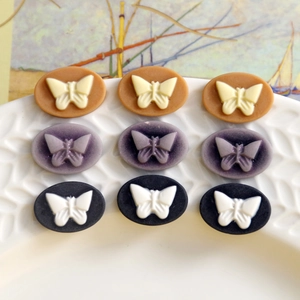 Vintage butterfly oval resin cabochons for DIY crafts in matte brown, purple and black