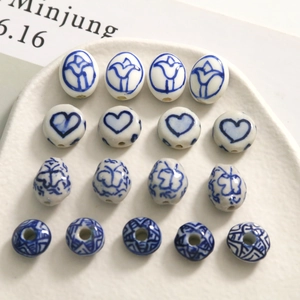 Blue and white ceramic beads in oval and round shapes for DIY jewelry making
