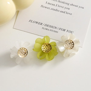 Sweet acrylic frosted flower charms in white and green with gold center for DIY jewelry