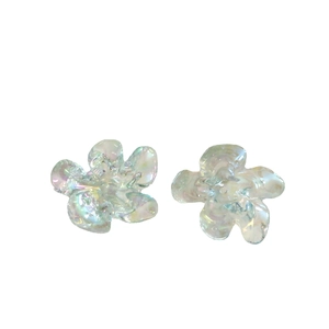 Pair of iridescent translucent resin flower accessories with rainbow luster and opal shine
