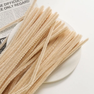 Close-up of soft off-white velvet pipe cleaners for creative DIY jewelry making