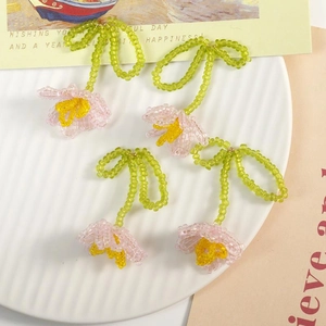 Handmade pink and green tulip glass bead earrings with floral design for women