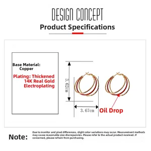 Detailed view of layered 14K gold-plated copper hoop earrings with red enamel coating