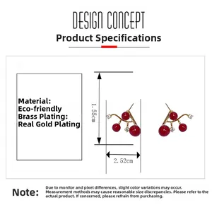 Detailed view of cherry pearl earrings with gold leaf and dimensions 1.55cm x 2.52cm