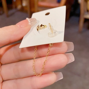 French vintage gold cross chain tassel ear cuff featuring a delicate rhinestone design