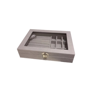 Gray velvet jewelry box with clear lid and metal clasp for rings and necklaces