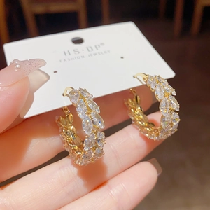 Elegant gold zircon hoop earrings with marquise-cut stones in a wheat-leaf pattern