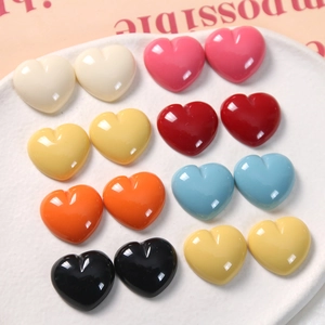 Colorful glossy heart-shaped resin charms for DIY jewelry and hair accessories in seven colors