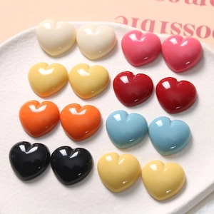 Polished heart-shaped resin charms in eight assorted colors for DIY jewelry making
