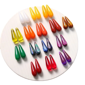 Vibrant resin teardrop charms in various colors for DIY jewelry on white background