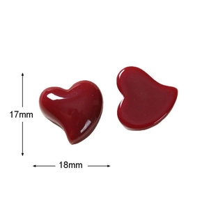 Detailed view of red heart resin charms with 17mm x 18mm size dimensions
