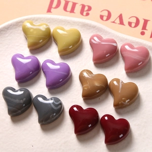 Handmade heart-shaped resin charms with marble texture for DIY jewelry and hair accessories